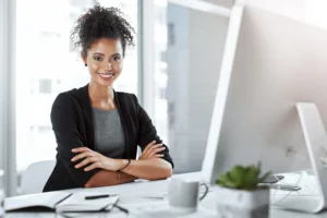 confident-about-state-business-portrait-young-businesswoman-working-her-desk-modern-office-scaled
